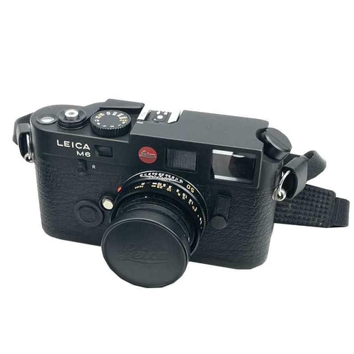 58 - A Leica M6 TTL black serial number 2497046 1999 with a Leica ELMAR-M 1:2. 8/50 E39 3727117 lens, Lei... 