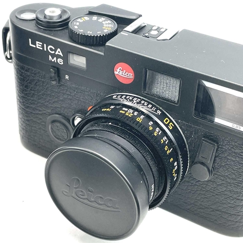 58 - A Leica M6 TTL black serial number 2497046 1999 with a Leica ELMAR-M 1:2. 8/50 E39 3727117 lens, Lei... 