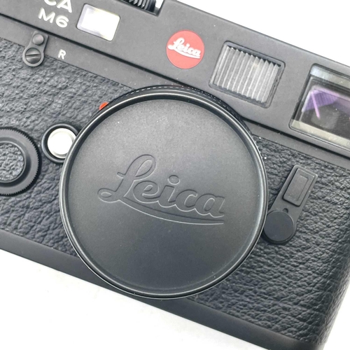 58 - A Leica M6 TTL black serial number 2497046 1999 with a Leica ELMAR-M 1:2. 8/50 E39 3727117 lens, Lei... 