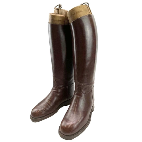 59 - A pair of brown leather riding boots and trees, height of boots 40cm.