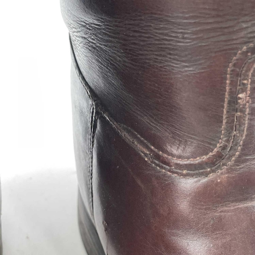 59 - A pair of brown leather riding boots and trees, height of boots 40cm.