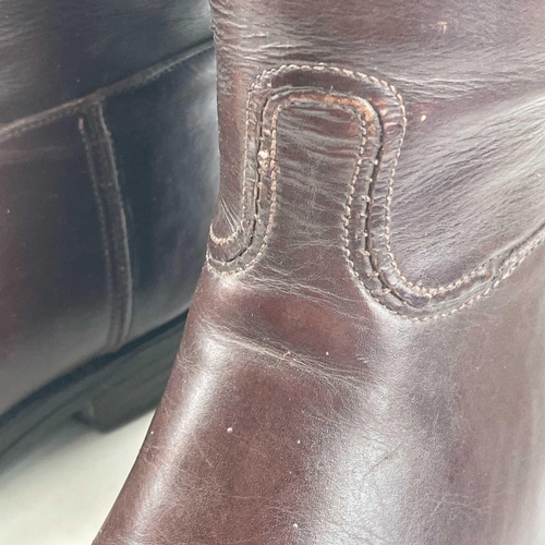 59 - A pair of brown leather riding boots and trees, height of boots 40cm.