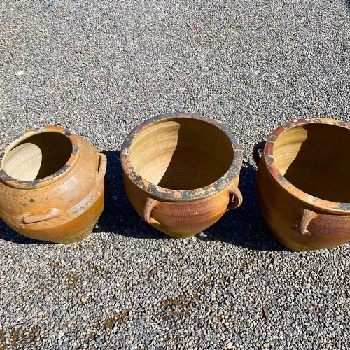 607 - A matched pair of large stoneware jardiniere with four lug handles, height 55cm diameter 63cm togeth... 