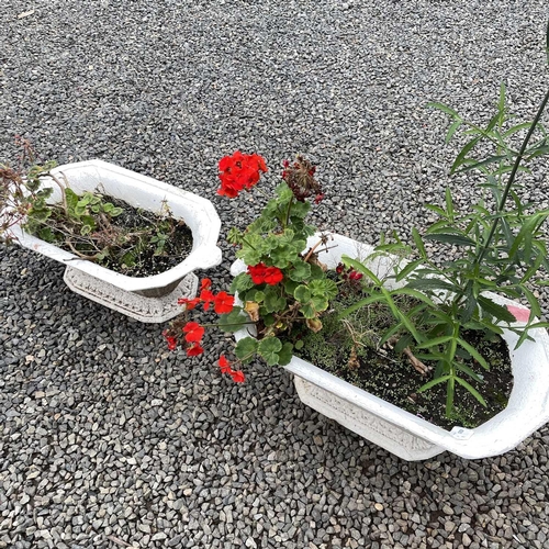 620 - Two Victorian cast iron shaped planters, the width of largest 67cm.