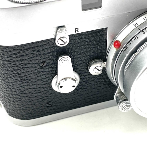 65 - A Leica Rangefinder M2 serial number 1051773 with a Ernst Leitz GmbH Wetzlar Elmar f=5cm 1:2:8 lens ... 