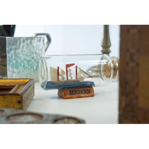 74 - A model of the sailing boat Ceres, in a Dimple bottle, labelled as purchased on a Honeymoon in Salco... 