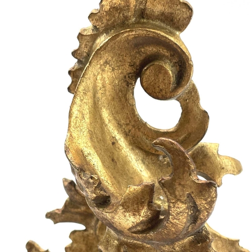 76 - A giltwood carved wall bracket, Florentine, early 20th century, with rococo scroll leafy supports, h... 