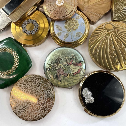 77 - A collection of approximately 34 powder compacts, mainly Stretton, 1930s and later including a silve... 