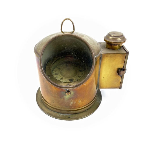 79 - A ship's brass binnacle compass, early 20th century, fitted with a side burner, height 25cm.