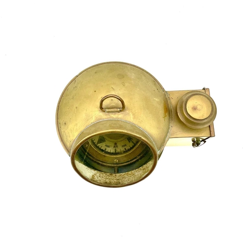 79 - A ship's brass binnacle compass, early 20th century, fitted with a side burner, height 25cm.