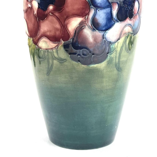 805 - William Moorcroft, anemone pattern vase, of baluster form, circa 1930, tube-lined and painted with t... 