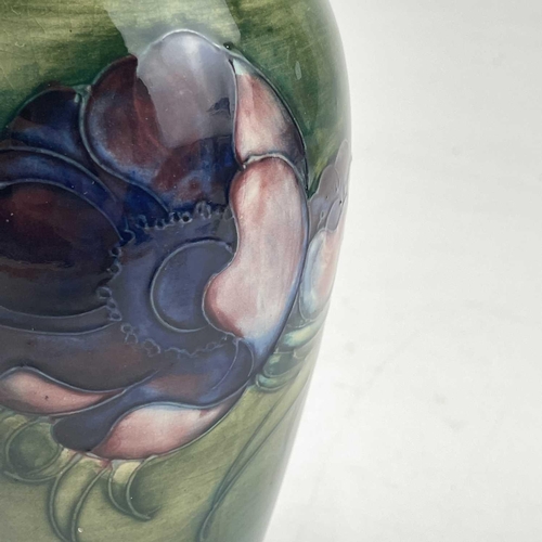 805 - William Moorcroft, anemone pattern vase, of baluster form, circa 1930, tube-lined and painted with t... 