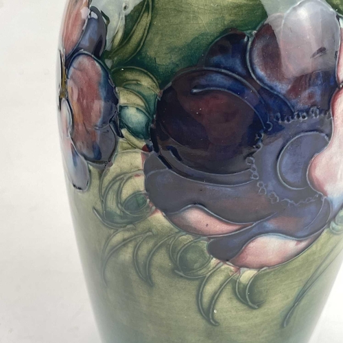 805 - William Moorcroft, anemone pattern vase, of baluster form, circa 1930, tube-lined and painted with t... 