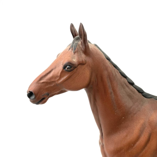 815 - Royal Doulton, a figure of Arkle, modelled by Graham Tongue, number 160/5000, height 32cm, with wood... 