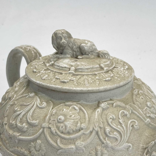 818 - Wedgwood, a saltglaze teapot and cover, with dog finial, impressed mark, circa 1820, height 12cm, to... 