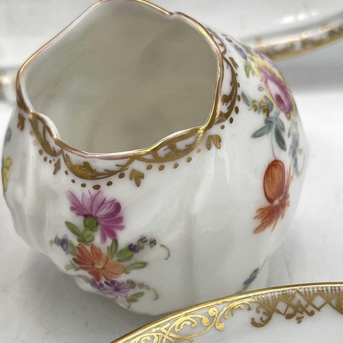 819 - A Meissen cabaret set, 19th century, comprising; a shaped oval tray, a coffee pot and cover, a sugar... 