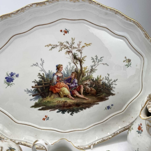 819 - A Meissen cabaret set, 19th century, comprising; a shaped oval tray, a coffee pot and cover, a sugar... 