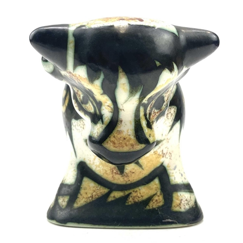 821 - A Celtic, Newlyn pottery bull decorated in the folksy pattern, with original printed label, height 1... 