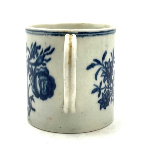 823 - A Worcester blue and white coffee can, circa 1770, printed with the 'Three Flowers and a Butterfly' ... 