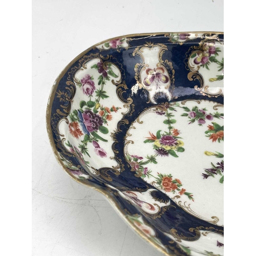 825 - A pair of Worcester blue scale porcelain dishes, circa 1775, of kidney shape, with flower painted de... 