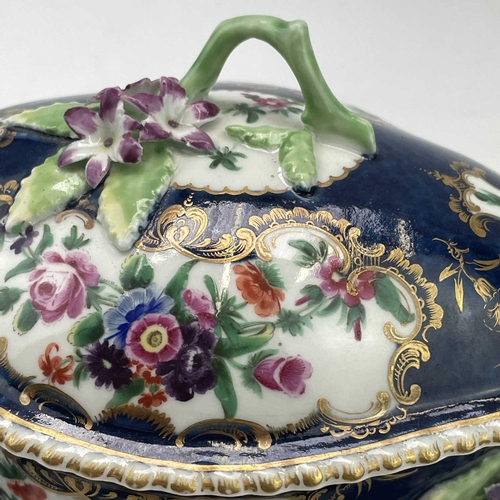 826 - A Worcester blue scale porcelain sauce tureen, cover and stand, circa 1770, with floral painted deco... 