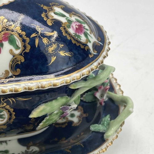 826 - A Worcester blue scale porcelain sauce tureen, cover and stand, circa 1770, with floral painted deco... 