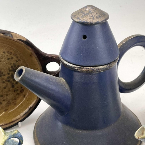 833 - An Art Deco style teapot and cover modelled with geometric shapes signed to base Julie? Wood, height... 