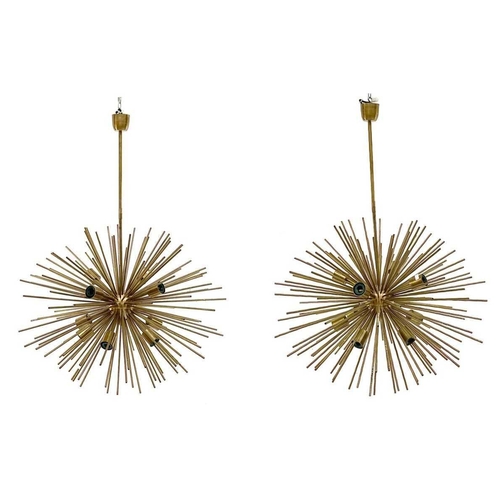 84 - A pair of modern retro style light fittings, each with numerous spikes and fitted ten light branches... 