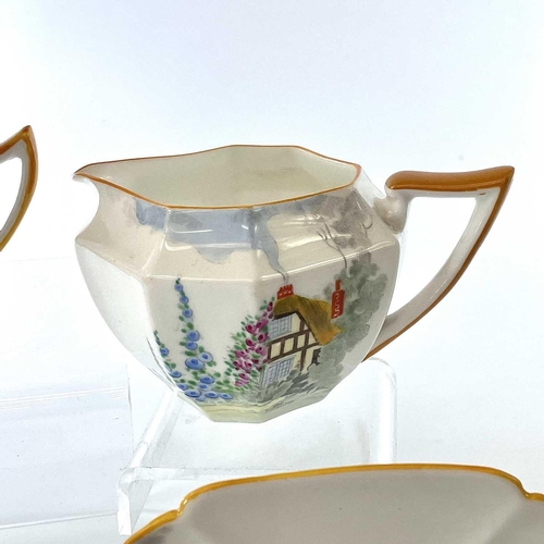 852 - A Shelley Queen Anne shape coffee service, decorated a cottage garden pattern, comprising a coffee p... 