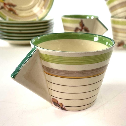 853 - Clarice Cliff, green Hydrangea, a set of eight cups and saucers, the cups with slightly indented tri... 