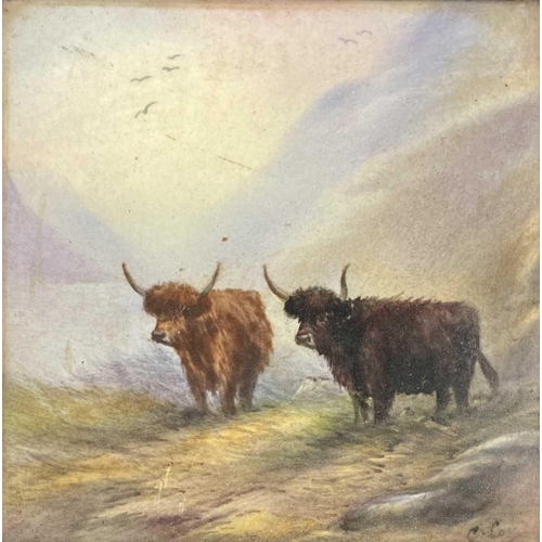 856 - A pair of Feildings Crown Devon pottery wall plaques decorated with highland cattle by G Cox in orig... 