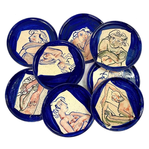 868 - A set of eight mid-century French pottery dishes painted with nudes, each stamped A Prevost? and ind... 