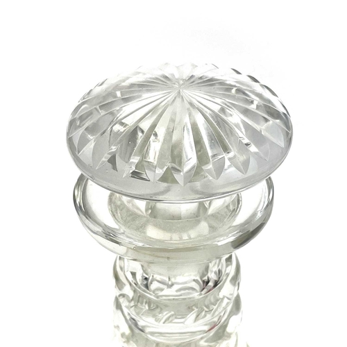 876 - A 19th century cut glass ship's decanter and stopper with quadruple ring neck, height 25cm.