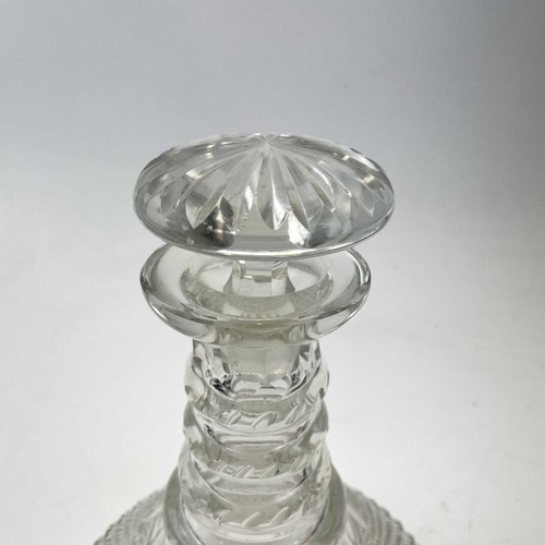 876 - A 19th century cut glass ship's decanter and stopper with quadruple ring neck, height 25cm.