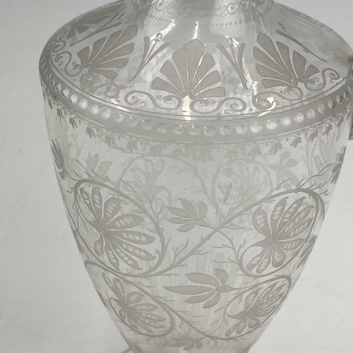 891 - A Victorian etched glass Champagne ewer, with Greek key and anthemion borders and decorated trailing... 