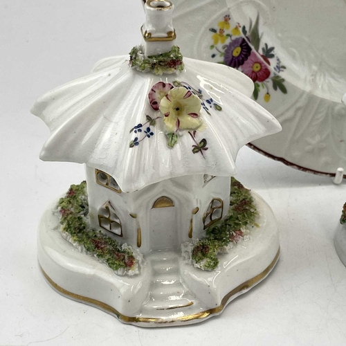 896 - An early Victorian Staffordshire porcellaneous pastille burner, modelled as a cottage, height 12cm, ... 