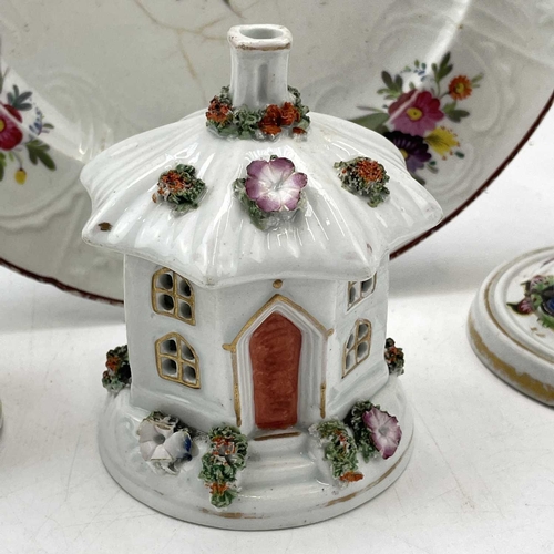 896 - An early Victorian Staffordshire porcellaneous pastille burner, modelled as a cottage, height 12cm, ... 