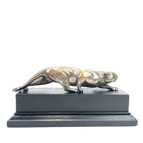 9 - An Art Deco bronze model of a prowling panther, with remnants of plated finish, on an ebonised base,... 