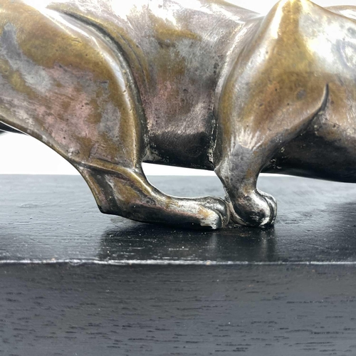 9 - An Art Deco bronze model of a prowling panther, with remnants of plated finish, on an ebonised base,... 