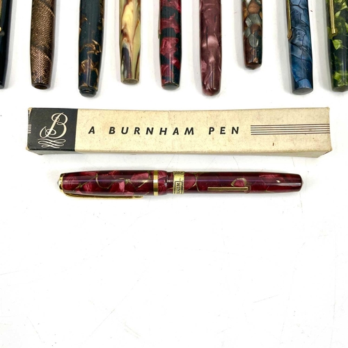 91 - A Burnham red marbled fountain pen No 47 with box together with four other Burnham fountain pens and... 