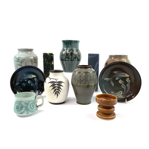 911 - A collection of Lamorna pottery, comprising two square section vases, five other vases, and other pi... 