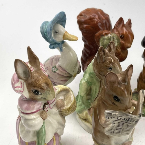 916 - A Beswick Beatrix potter figure of Peter Rabbit, height 11.5cm together with seventeen other Beswick... 