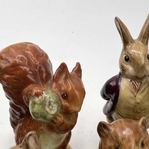 916 - A Beswick Beatrix potter figure of Peter Rabbit, height 11.5cm together with seventeen other Beswick... 