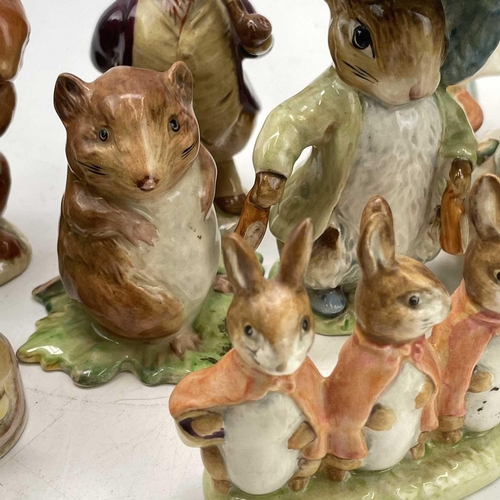 916 - A Beswick Beatrix potter figure of Peter Rabbit, height 11.5cm together with seventeen other Beswick... 