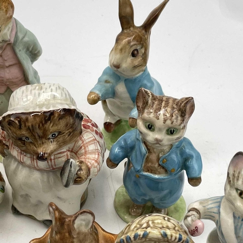 916 - A Beswick Beatrix potter figure of Peter Rabbit, height 11.5cm together with seventeen other Beswick... 