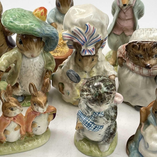 916 - A Beswick Beatrix potter figure of Peter Rabbit, height 11.5cm together with seventeen other Beswick... 