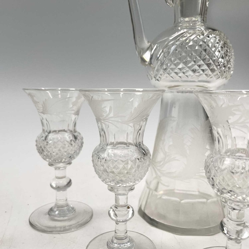 920 - An Edinburgh crystal cut glass tot set, comprising a handled decanter, the stopper incorporating a t... 