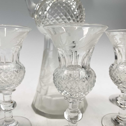 920 - An Edinburgh crystal cut glass tot set, comprising a handled decanter, the stopper incorporating a t... 