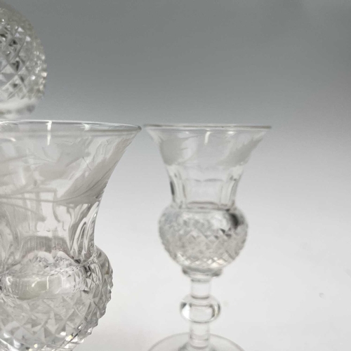 920 - An Edinburgh crystal cut glass tot set, comprising a handled decanter, the stopper incorporating a t... 