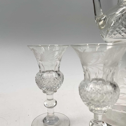 920 - An Edinburgh crystal cut glass tot set, comprising a handled decanter, the stopper incorporating a t... 